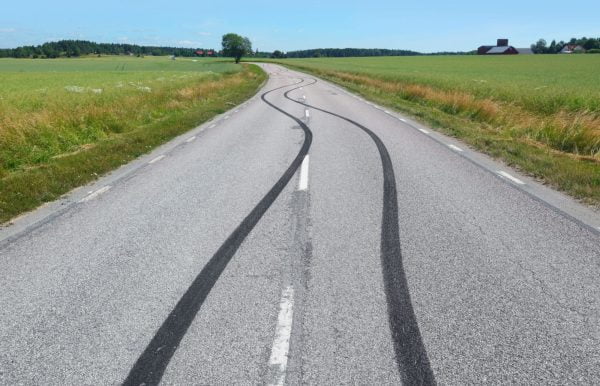 Tire print on asphalt road