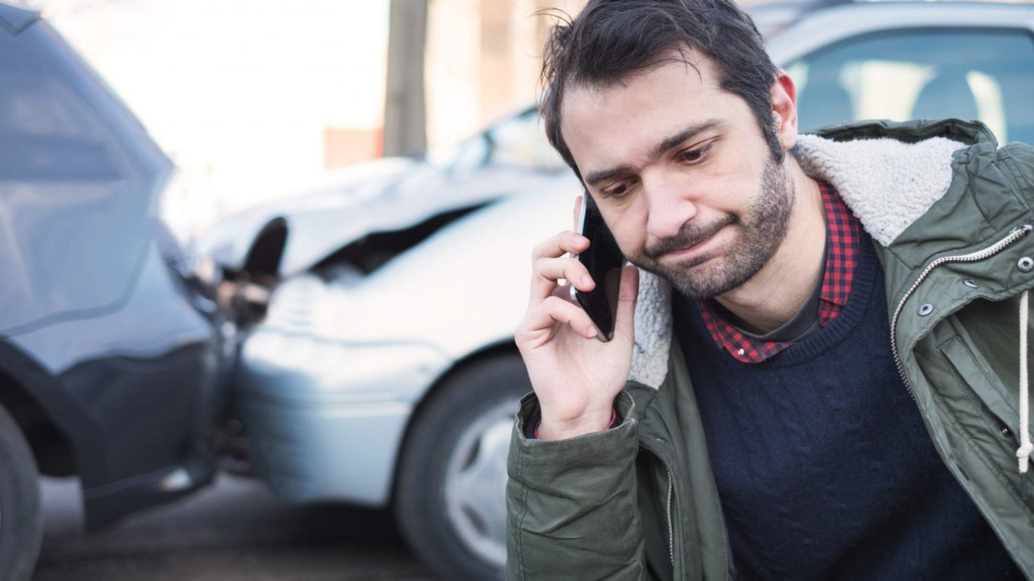 Male Driver Reporting A Car Accident 